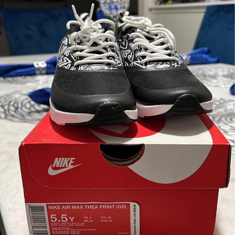 Nike Big kids black and white sneakers.